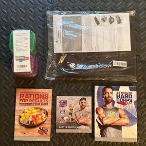 22 Minute Hard Corps DVDs, Portion control containers and Sandbag.